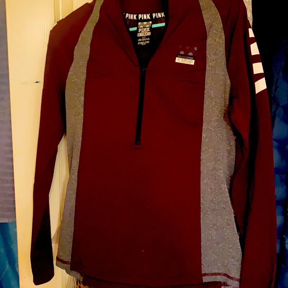 Victoria secret pink long sleeve pullover. Worn twice was too small. Has zipper